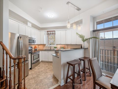 Photo 7 at 34 Fairhead Mews, Danforth, Toronto