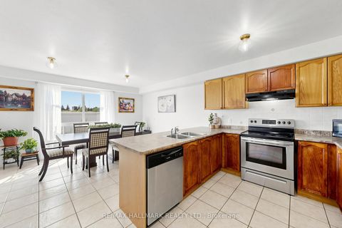 Photo 10 at 132 - 36 Jenkinson Way, Dorset Park, Toronto