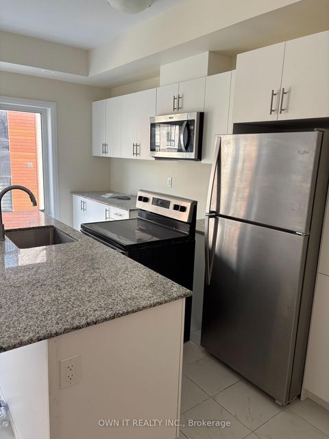 Photo 3 at 12 - 25 Priya Lane, Malvern, Toronto