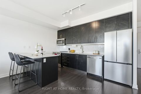 Photo 13 at 411 - 5101 Dundas Street W, City Centre West, Toronto