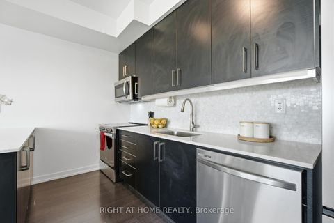 Photo 15 at 411 - 5101 Dundas Street W, City Centre West, Toronto