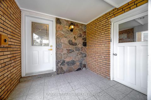 Photo 2 at 483 Huntingwood Drive, Sullivan, Toronto