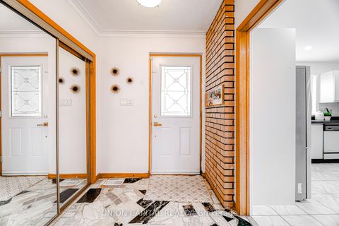 Photo 3 at 483 Huntingwood Drive, Sullivan, Toronto
