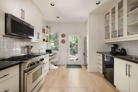 Photo 10 at 105 De Grassi Street, South Riverdale, Toronto