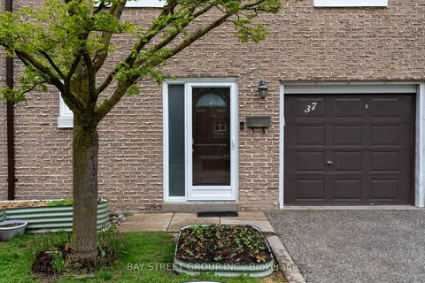 Photo 1 at 37 - 671 Huntingwood Drive, Sullivan, Toronto