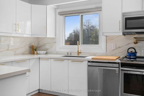 Photo 11 at 37 - 671 Huntingwood Drive, Sullivan, Toronto
