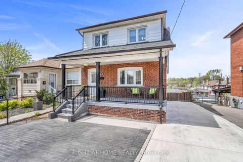 Photo 2 at 12 Porter Avenue, Smythe, Toronto