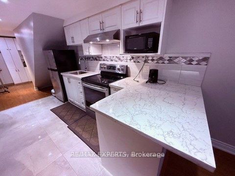 Photo 28 at 44 - 30 Dundalk Drive, Dorset Park, Toronto