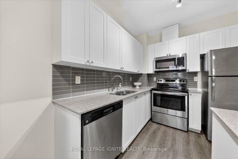 Photo 10 at 109 - 3560 St Clair Avenue E, Scarborough Village, Toronto