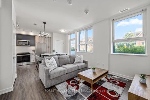 Photo 1 at 103 - 2300 St Clair Avenue W, Junction Area, Toronto