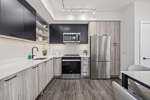 Photo 4 at 103 - 2300 St Clair Avenue W, Junction Area, Toronto