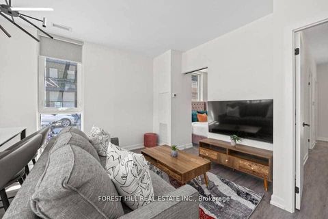 Photo 2 at 101 - 2300 St Clair Avenue W, Junction Area, Toronto