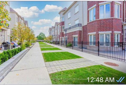 Photo 2 at 07 - 21 Coneflower Crescent, Branson, Toronto
