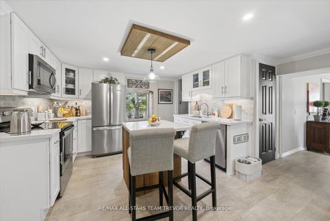 Photo 7 at 24082 Warden Avenue, Belhaven, Georgina