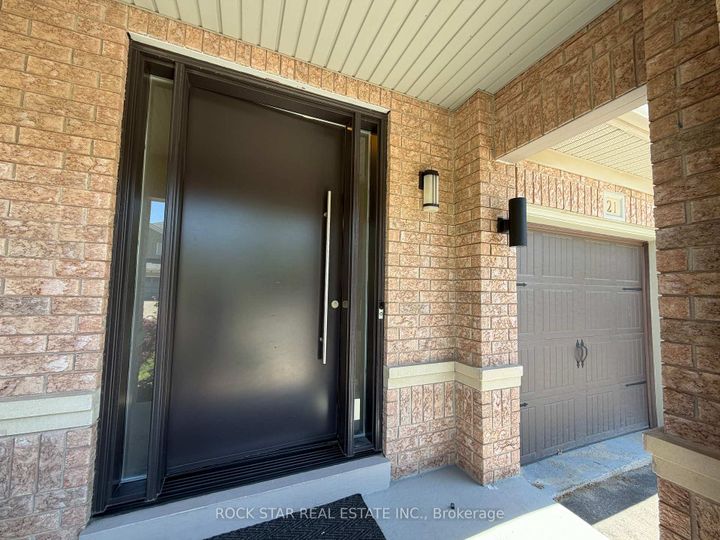 Photo 2 at 21 Trudelle Crescent, Fletcher's Meadow, Brampton