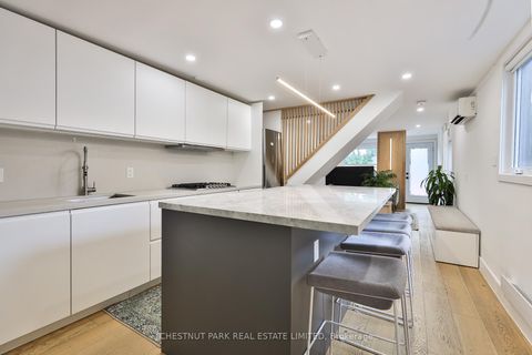 Photo 2 at 119 Craven Road, Coxwell, Toronto