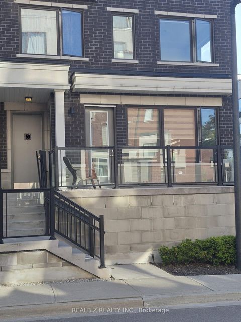 Photo 1 at 77 - 400 Alex Gardner Circle, Aurora Village, Aurora