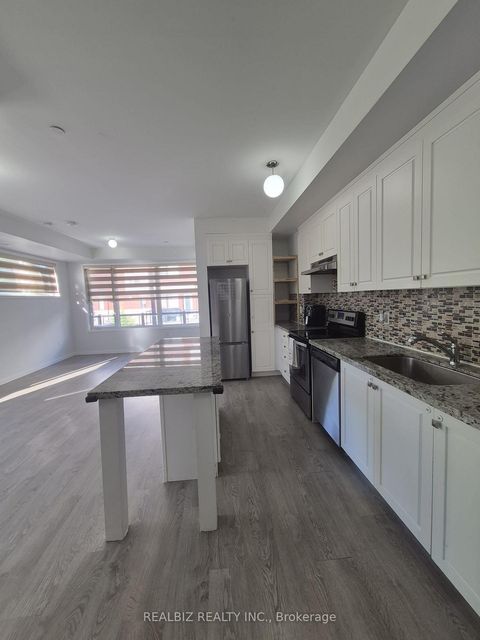 Photo 4 at 77 - 400 Alex Gardner Circle, Aurora Village, Aurora