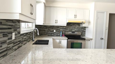Photo 2 at 81 Heaslip Terrace, Sullivan, Toronto