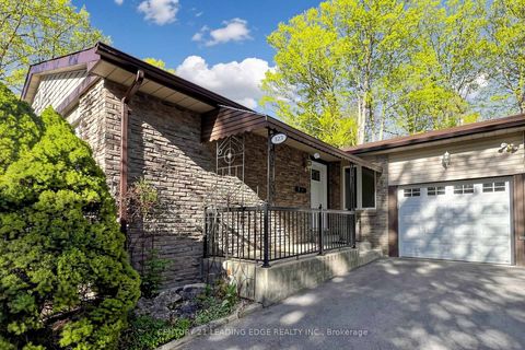 Photo 1 at 323 Waratah Avenue, Leslie Valley, Newmarket