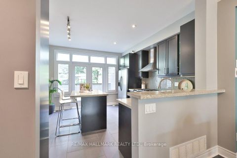 Photo 5 at 32 Lobo Mews, City Centre West, Toronto