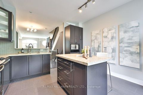 Photo 6 at 32 Lobo Mews, City Centre West, Toronto