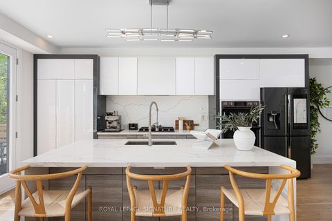 Photo 12 at 569 Craven Road, Coxwell, Toronto