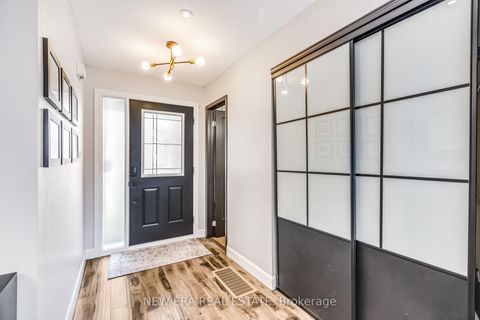 Photo 2 at 6 - 1415 Fieldlight Boulevard, Liverpool, Pickering