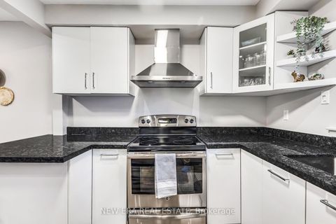 Photo 4 at 6 - 1415 Fieldlight Boulevard, Liverpool, Pickering