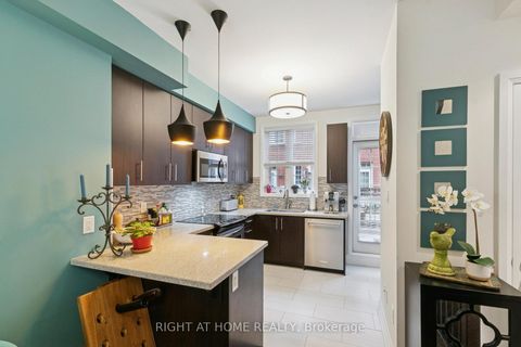 Photo 5 at 28 Raffeix Lane, Moss Park, Toronto