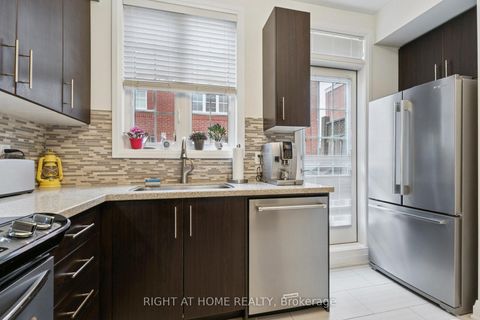 Photo 7 at 28 Raffeix Lane, Moss Park, Toronto