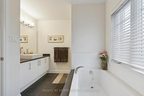 Photo 13 at 28 Raffeix Lane, Moss Park, Toronto
