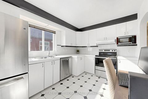Photo 3 at 40 Donora Drive, Crescent Town, Toronto