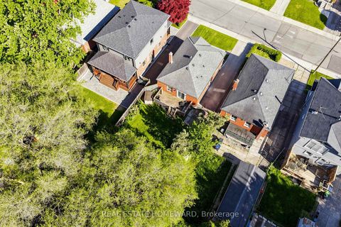 Photo 30 at 40 Donora Drive, Crescent Town, Toronto