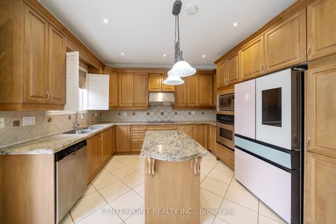 Photo 11 at 9 Summeridge Drive, Patterson, Vaughan