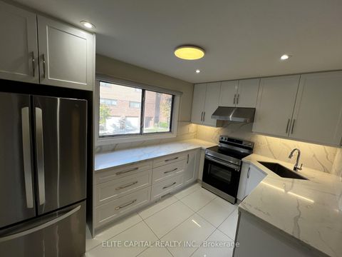 Photo 5 at 29 Burnt Meadoway, Hillcrest Village, Toronto