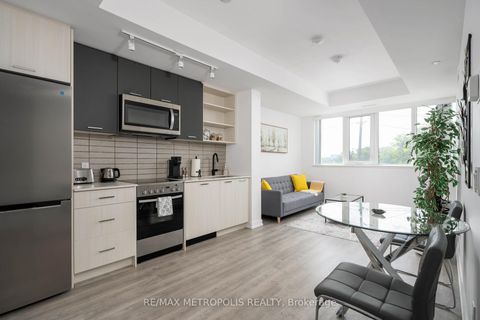 Photo 1 at 307 - 2300 St Clair Avenue W, Junction Area, Toronto