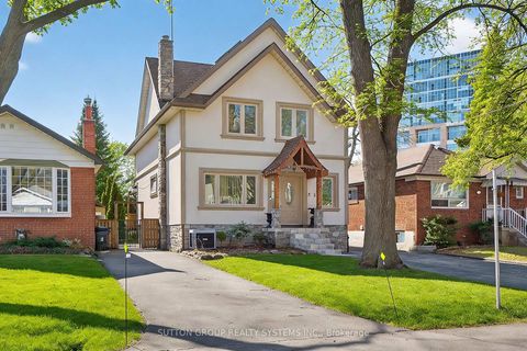 Photo 1 at 32 Green Lanes, City Centre West, Toronto