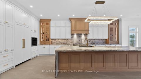 Photo 11 at 80 Callaway Court, Uplands, Vaughan