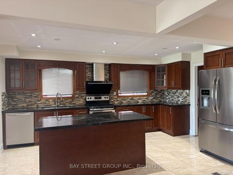 Photo 2 at 32 Perthshire Street, L'Amoreaux, Toronto