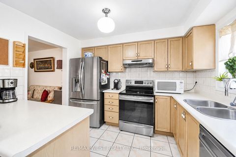 Photo 2 at 70 - 77 Norman Wesley Way, CFB, Toronto