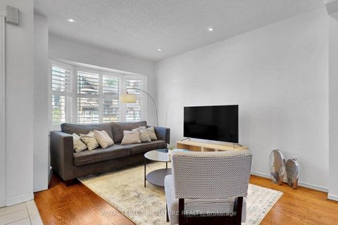 Photo 2 at 75 Doncaster Avenue, Crescent Town, Toronto