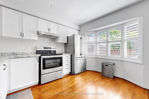 Photo 7 at 75 Doncaster Avenue, Crescent Town, Toronto