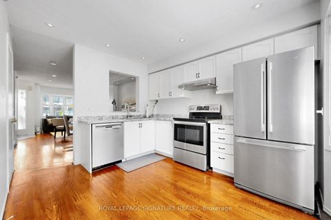 Photo 9 at 75 Doncaster Avenue, Crescent Town, Toronto