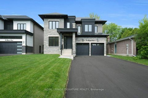 Photo 1 at 92 Howard Road, Leslie Valley, Newmarket