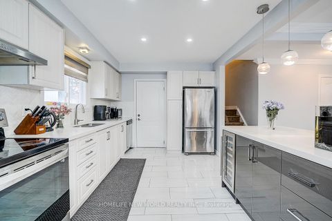 Photo 13 at 47 Manorglen Crescent, Malvern West, Toronto