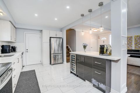 Photo 14 at 47 Manorglen Crescent, Malvern West, Toronto