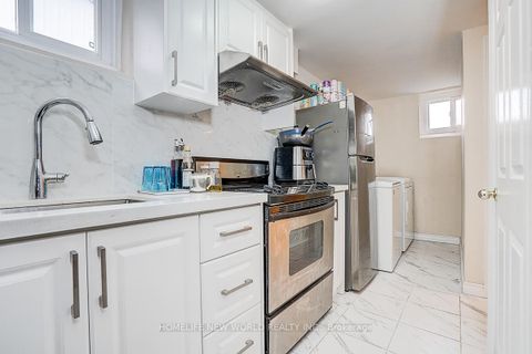 Photo 24 at 47 Manorglen Crescent, Malvern West, Toronto