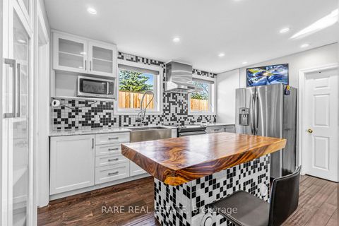 Photo 9 at 69 Fletcherdon Crescent, Black Creek, Toronto