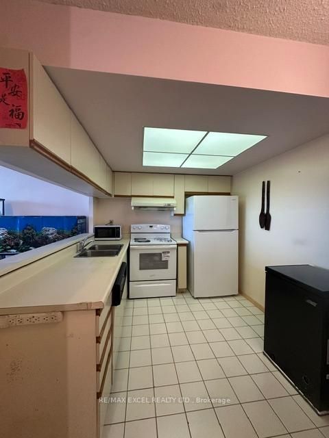 Photo 9 at 806 - 300 Alton Towers Circle, Milliken, Toronto